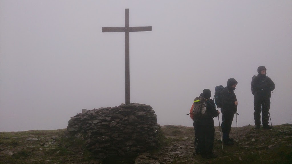 Brandon-2Bmountain-2Bsummit-2B-2Bcross-2B-2BTralee-2Bweekend-2Bday-2B1 a man standing in front of a hill