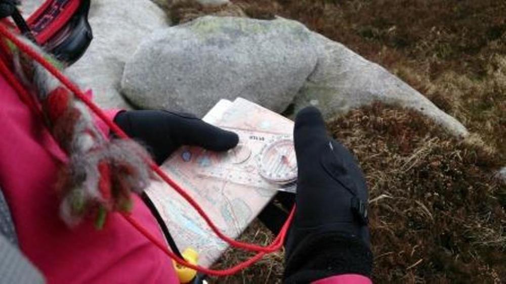 Taking a compass bearing from a map