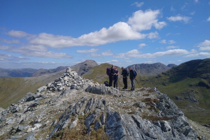 a man standing on top of a mountain